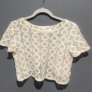 small cream knit top/coverup with open back